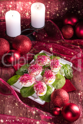 boiled eggs with red beet sprouts