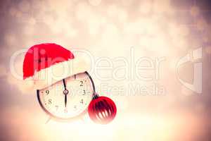 Composite image of christmas clock