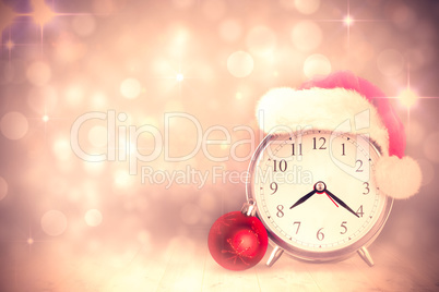 Composite image of christmas clock