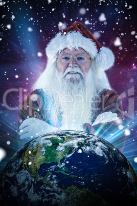 Composite image of santa smiles with folded arms