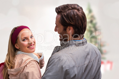 Composite image of smiling man having arm around girlfriend look