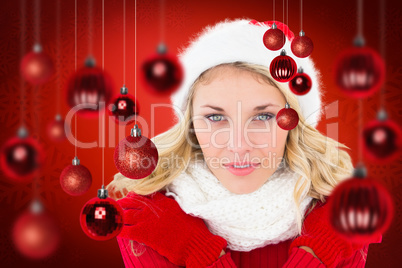 Composite image of happy festive blonde