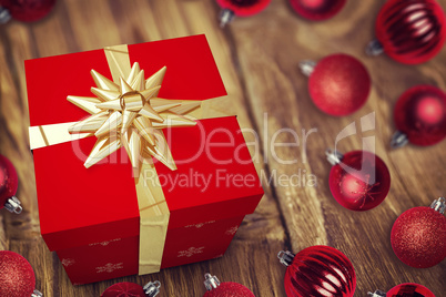 A red Christmas gift with ribbon