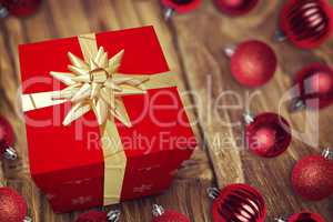 A red Christmas gift with ribbon