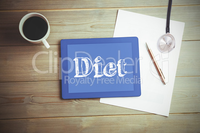 Diet against high angle view of digital tablet and document with