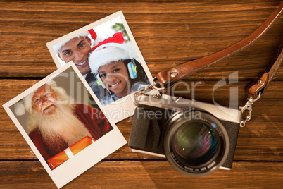 Composite image of happy santa holding a glowing gift