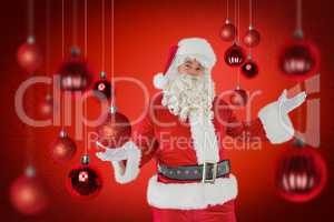 Composite image of father christmas with his hands out