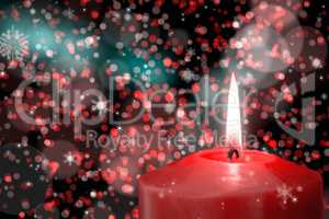 Composite image of red candle