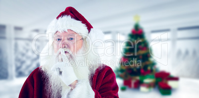 Composite image of santa asking for quiet to camera