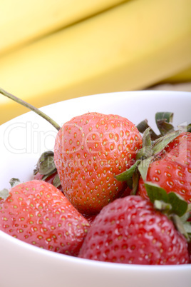 strawberries and bananas close up, health food concept