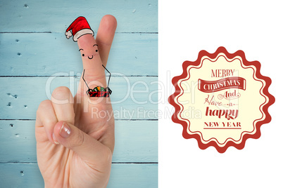 Composite image of christmas fingers