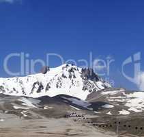 Ski resort in spring at nice sun day