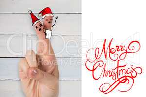 Composite image of christmas fingers