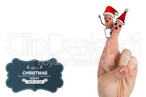 Composite image of christmas fingers