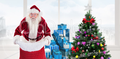 Composite image of santa open his red bag