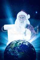 Composite image of father christmas holds a list