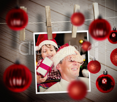 Composite image of christmas baubles