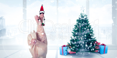 Composite image of christmas fingers