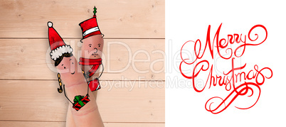 Composite image of christmas fingers