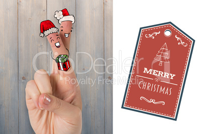 Composite image of christmas fingers