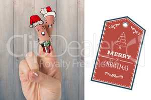 Composite image of christmas fingers