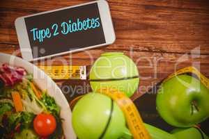 Type 2 diabetes against phone on healthy persons desk