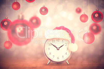 Composite image of christmas clock