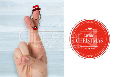 Composite image of christmas fingers