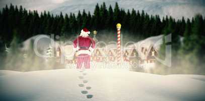 Composite image of santa standing with hands on hips