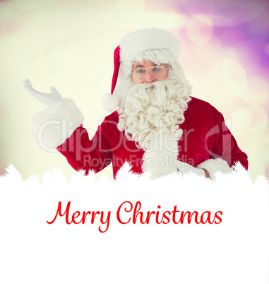 Composite image of happy santa with his hand out