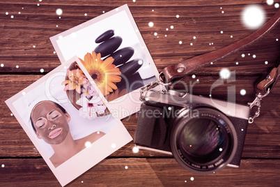 Composite image of smiling brunette getting a mud treatment faci