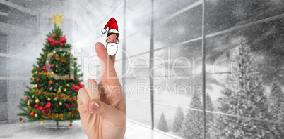 Composite image of christmas fingers