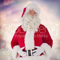 Composite image of santa claus holding his belly