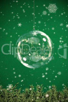 Composite image of christmas bauble