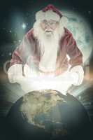 Composite image of santa open his red bag