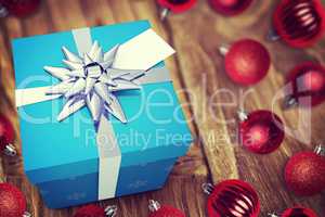 A blue Christmas gift with ribbon