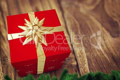 A red Christmas gift with ribbon