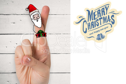 Composite image of christmas fingers