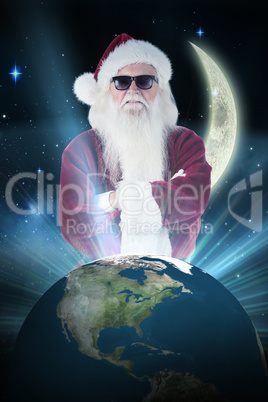 Composite image of santa claus wears black sunglasses