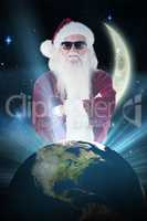 Composite image of santa claus wears black sunglasses