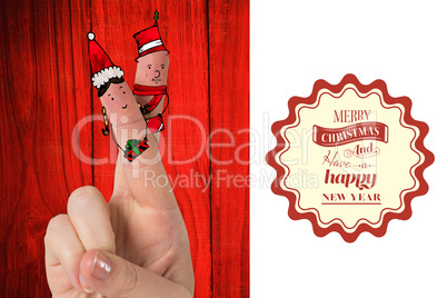 Composite image of christmas fingers