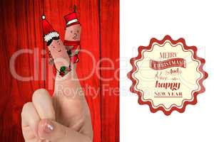 Composite image of christmas fingers