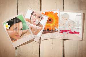 Composite image of beautiful happy woman blowing flower petals at spa center