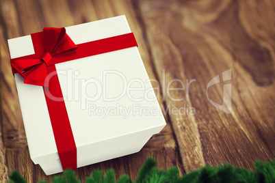 A white Christmas gift with ribbon