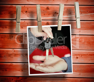 Composite image of photo hanging from line