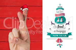 Composite image of christmas fingers