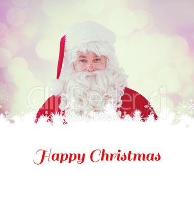 Composite image of portrait of smiling santa claus