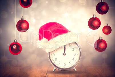 Composite image of christmas clock