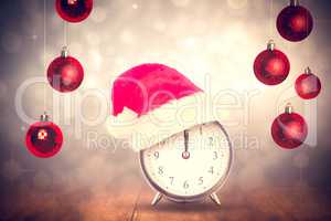 Composite image of christmas clock