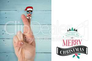 Composite image of christmas fingers